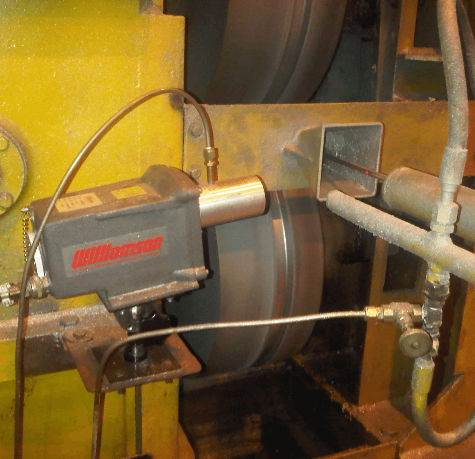 Williamson Pyrometer measuring aluminum wire temperature as it enters the winder